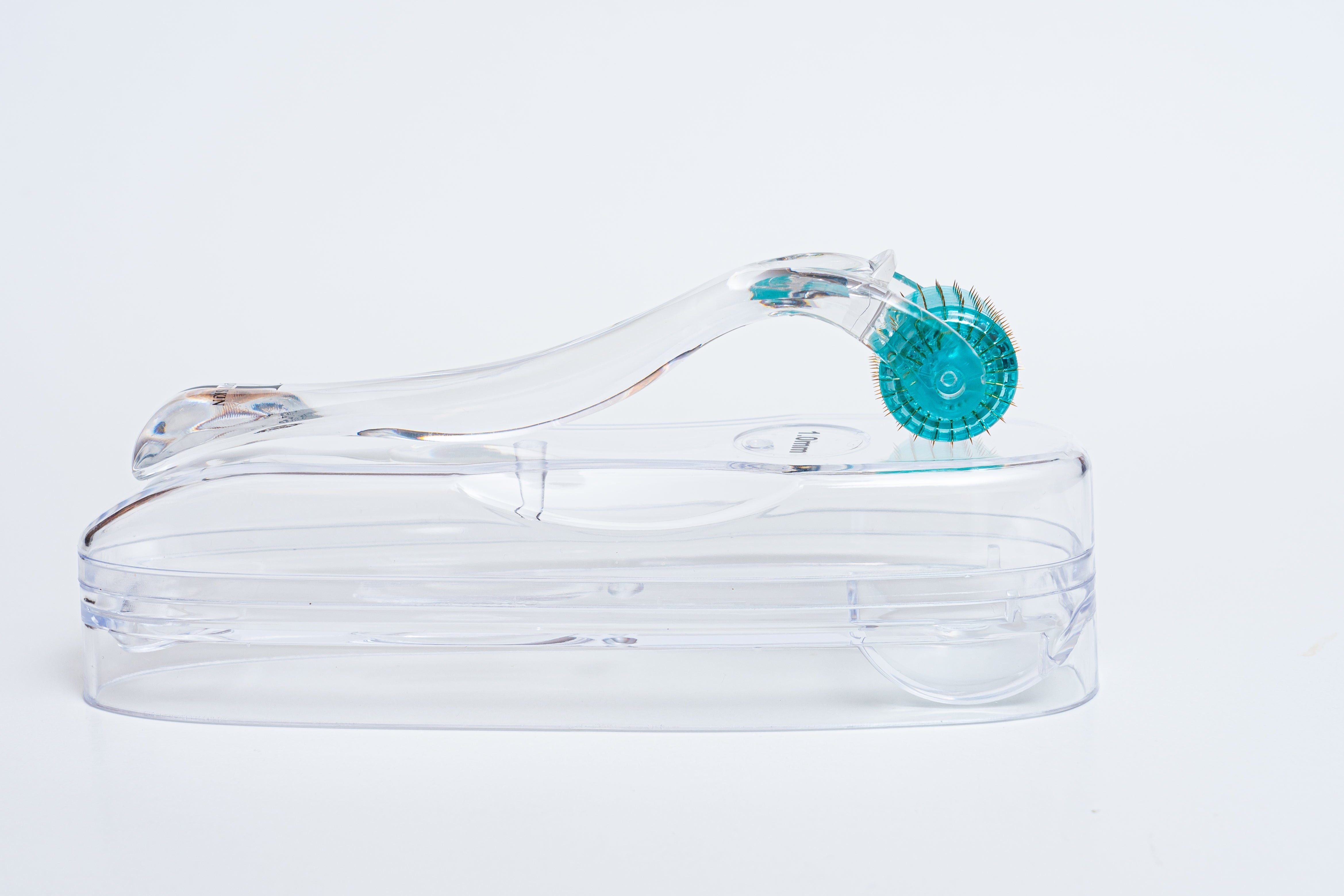 Clear jelly sandal with a blue buckle on a white background